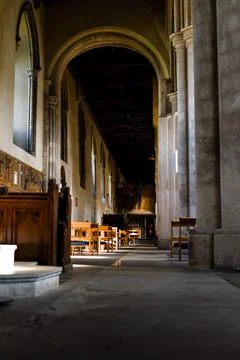 Cathedral interior from low angle with seating where church services take pla Stock Photos