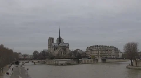 Cathedral Notre Dame de Paris and Île de la Cité Stock Footage 10760176