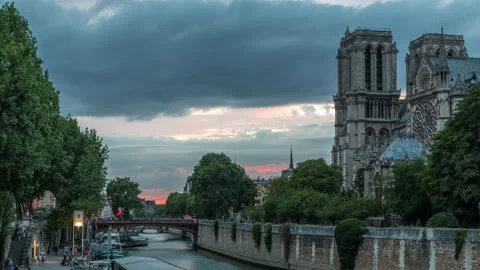 Cathedral Notre Dame de Paris day to night timelapse after sunset in Paris Stock Footage 236709053