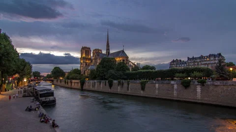 Cathedral Notre Dame de Paris day to night timelapse after sunset in Paris Stock Footage 236709586