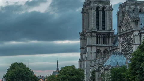 Cathedral Notre Dame de Paris day to night timelapse after sunset in Paris Stock Footage 276415520