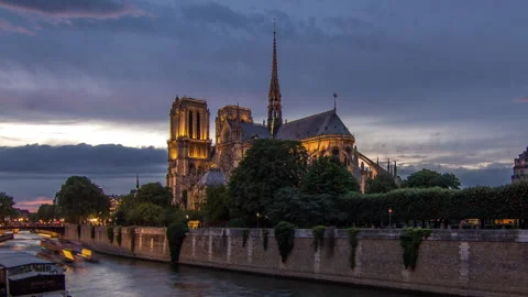 Cathedral Notre Dame de Paris day to night timelapse after sunset in Paris Stock Footage 276415767