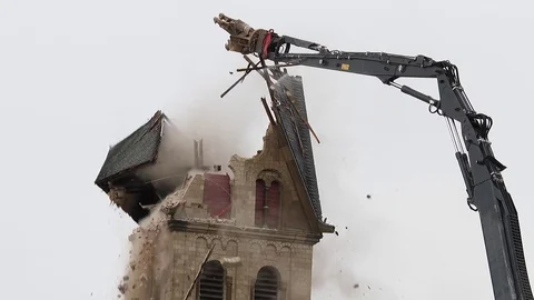 Cathedral is razed to the ground as it begins demolition of an entire village Stock Footage 85011021
