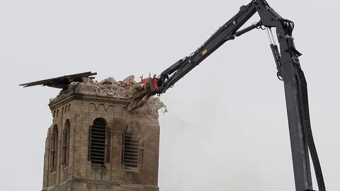 Cathedral is razed to the ground as it begins demolition of an entire village Stock Footage 85011088