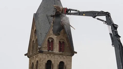 Cathedral is razed to the ground as it begins demolition of an entire village Stock Footage 85019957