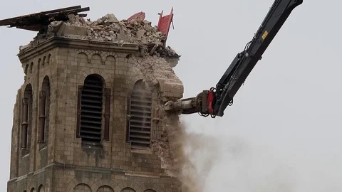 Cathedral is razed to the ground as it begins demolition of an entire village Stock Footage 85020983