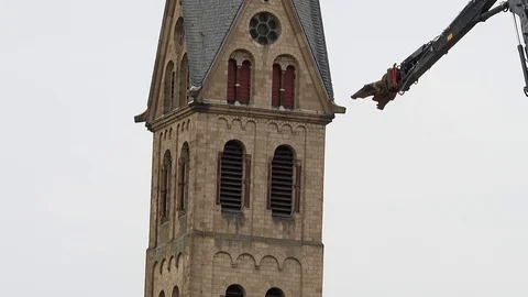 Cathedral is razed to the ground as it begins demolition of an entire village Stock Footage 85021037