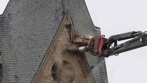 Cathedral is razed to the ground as it begins demolition of an entire village Stock Footage 85026429