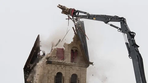 Cathedral is razed to the ground as it begins demolition of an entire village Stock Footage 85026560