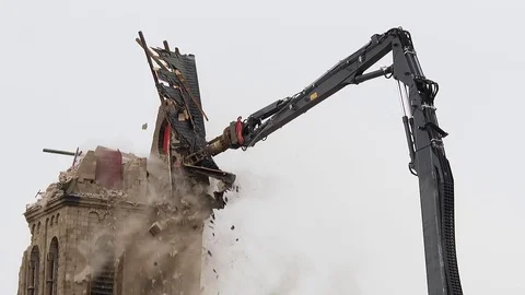 Cathedral is razed to the ground as it begins demolition of an entire village Stock Footage 85027630
