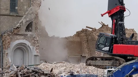 Cathedral is razed to the ground as it begins demolition of an entire village Stock Footage 85029244