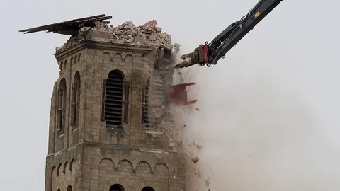 Cathedral is razed to the ground as it begins demolition of an entire village Stock Footage 85030378