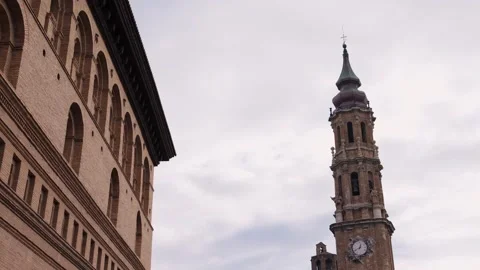 Cathedral tower on sky and clouds background. Historic city center. Famous Stock Footage 315227976