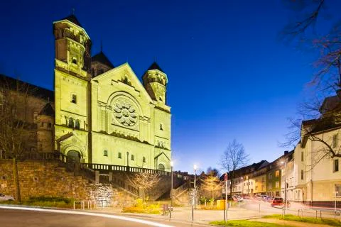 The catholic Herz-Jesu church in Aachen Burtscheid, Germany with night blue s Stock Photos