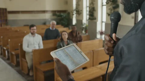 Catholic Priest Using Digital Tablet Stock Footage 230829747