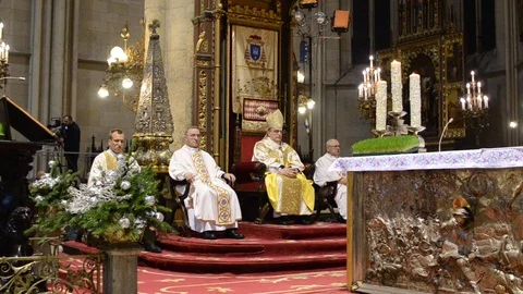 Catholic priests perform the Midnight Mass at Cathedral.Roman Catholic service Stock Footage 100600593