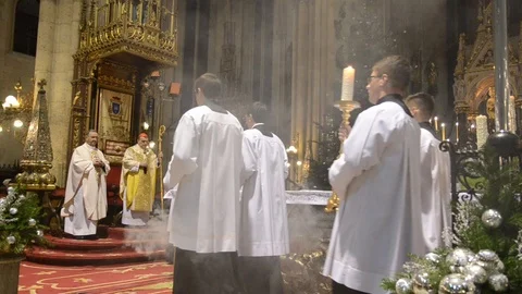 Catholic priests perform the Midnight Mass at Cathedral Stock Footage 100601206