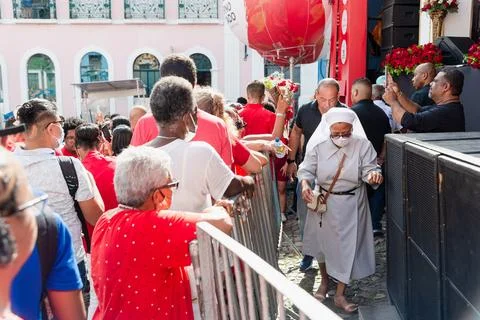 Catholics are seen at the outdoor mass in Pelourinho in honor of Santa Barbar Stock Photos