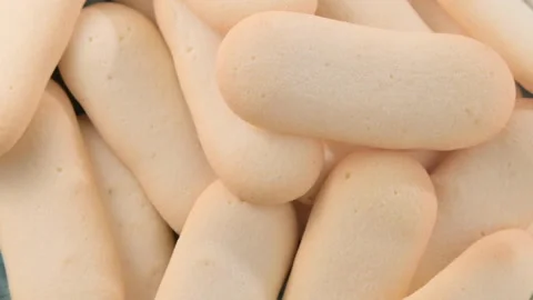 Cat's tongues These are thin and tender cookies made from egg yolks and sugar Stock Footage 204875226