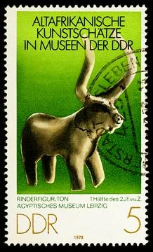 Cattle figure on postage stamp Stock Photos