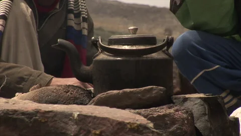 Cattle on fire for tea Stock Footage 203936316