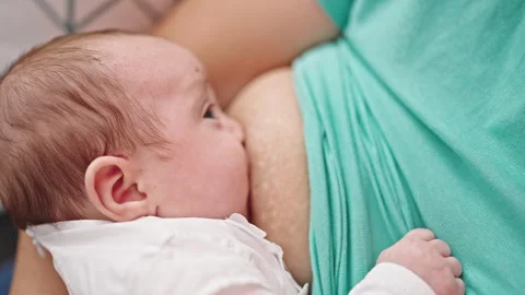 Girl Breastfeeding Puppy