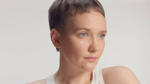 Caucasian blue eyed model alone in studio portrait Stock Footage 113190812