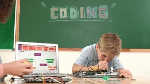 Caucasian boy fixing main board by using screwdriver at stem lesson. Pedagogy. Stock Footage 278128328
