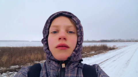 Caucasian boy looking into the camera, spinning. Stock Footage 46527070