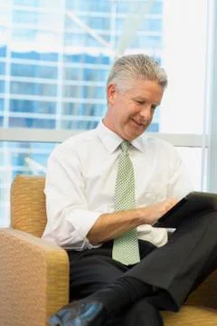 Caucasian businessman using tablet computer 스톡 사진