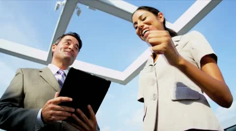 Caucasian businesswoman focusing online on investment banking on city rooftop Stock Footage
