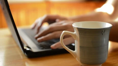 Caucasian busy suit man work on his laptop with a hot coffee beverage. Vidéo 211350104