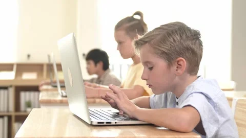 Caucasian child programing software system and learning about coding. Pedagogy. Stock Footage 277021801