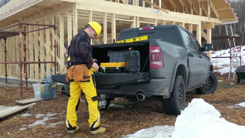 Caucasian Construction Contractor Preparing Himself and His Toolbox Stock Footage 147835759