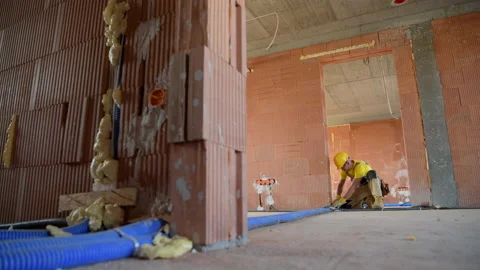 Caucasian Construction Worker Finishing Interior Floor Installation Elements Stock Footage 141034583