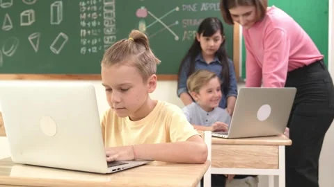 Caucasian cute boy focus on programing system while looking at camera. Pedagogy. Video stock 277355409