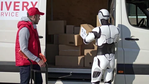 Caucasian delivery man with robot put parcel boxes from a van on a trolley Stock Footage 166174838