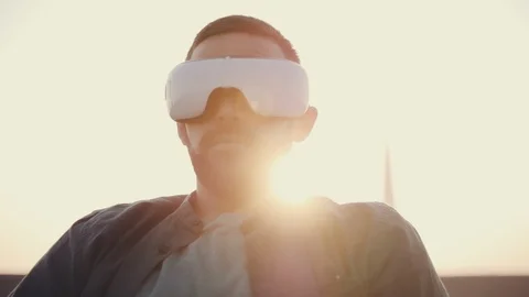 Caucasian desability man in wheelchair using virtual reality headset at sunny Stock Footage 110220184