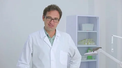 Caucasian doctor smiling at the camera Stock Footage 73773045