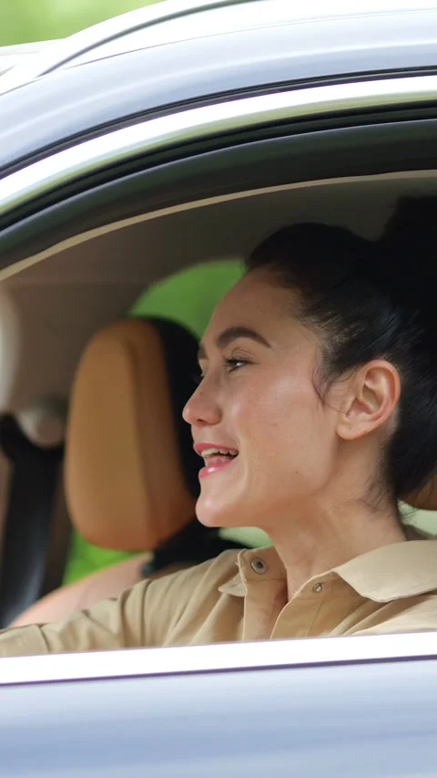 Caucasian Driver Singing At Wheel With Joy, Eyes Closed And Expressive Mouth Stock Footage 341443460