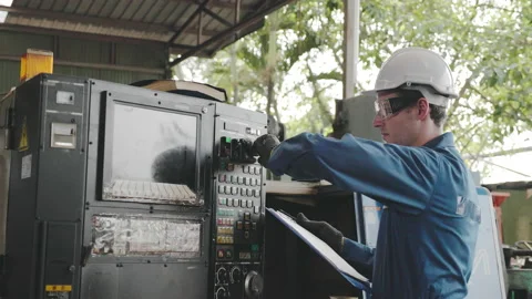 Caucasian Electrical engineer check machine mechanical. Wear hard hat Video stock 158680801