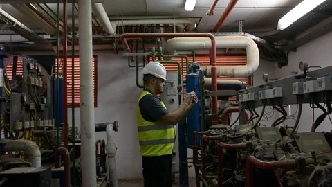 Caucasian Engineer with beard checking Cooling system, For the safety of the sys 스톡 동영상 108548455