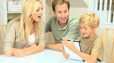 Caucasian Family Using Wireless Tablet Stock Footage 8987564