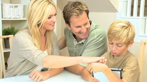 Caucasian Family Using Wireless Tablet Stock Footage 8987634