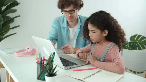 Caucasian father help student doing homework about engineering code. Pedagogy. Stock Footage 280709117