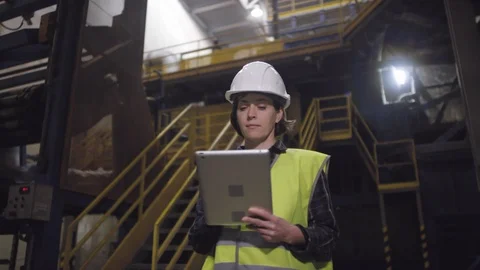 Caucasian Female Engineer Posing at Rockwool Manufacturing Plant Stock Footage 120401387