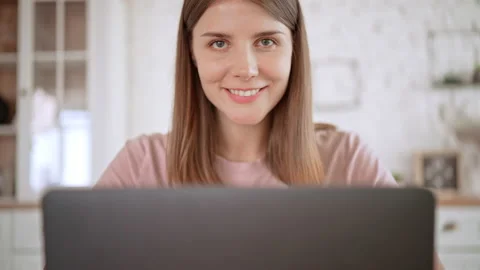 Caucasian female using computer in flat Stock Footage 162735712