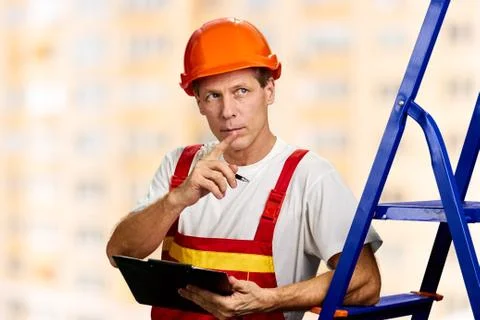 Caucasian foreman checking the object. Stock Photos