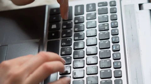 Caucasian freelancer working on computer at home office. Close up female hands Video stock 128552956