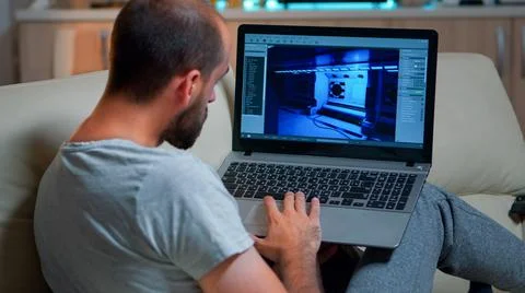 Caucasian game developer working on gameplay Stock Photos